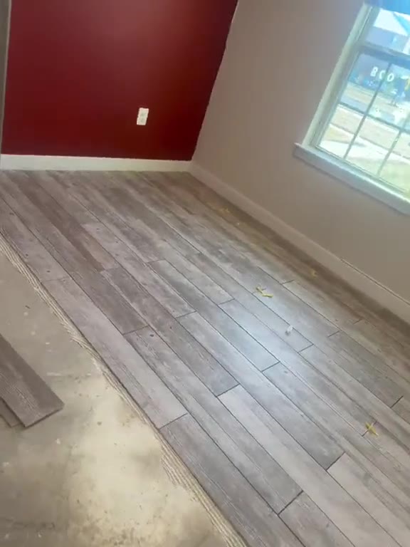 Video: wood-look plank flooring installed in a bedroom